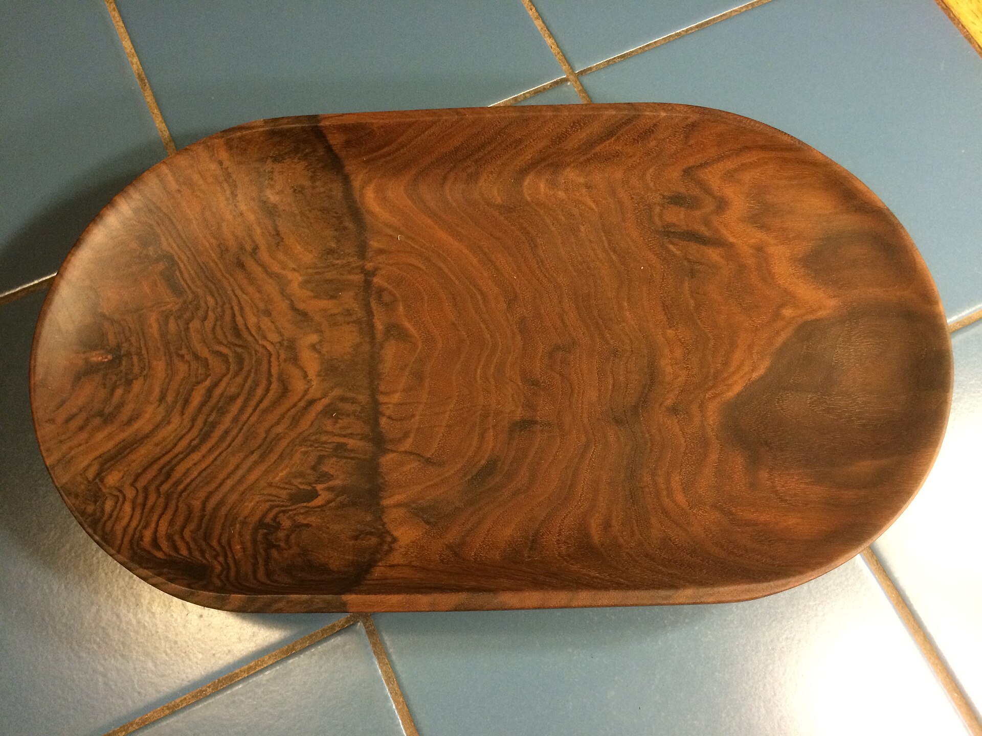 A finished turned wooden bowl