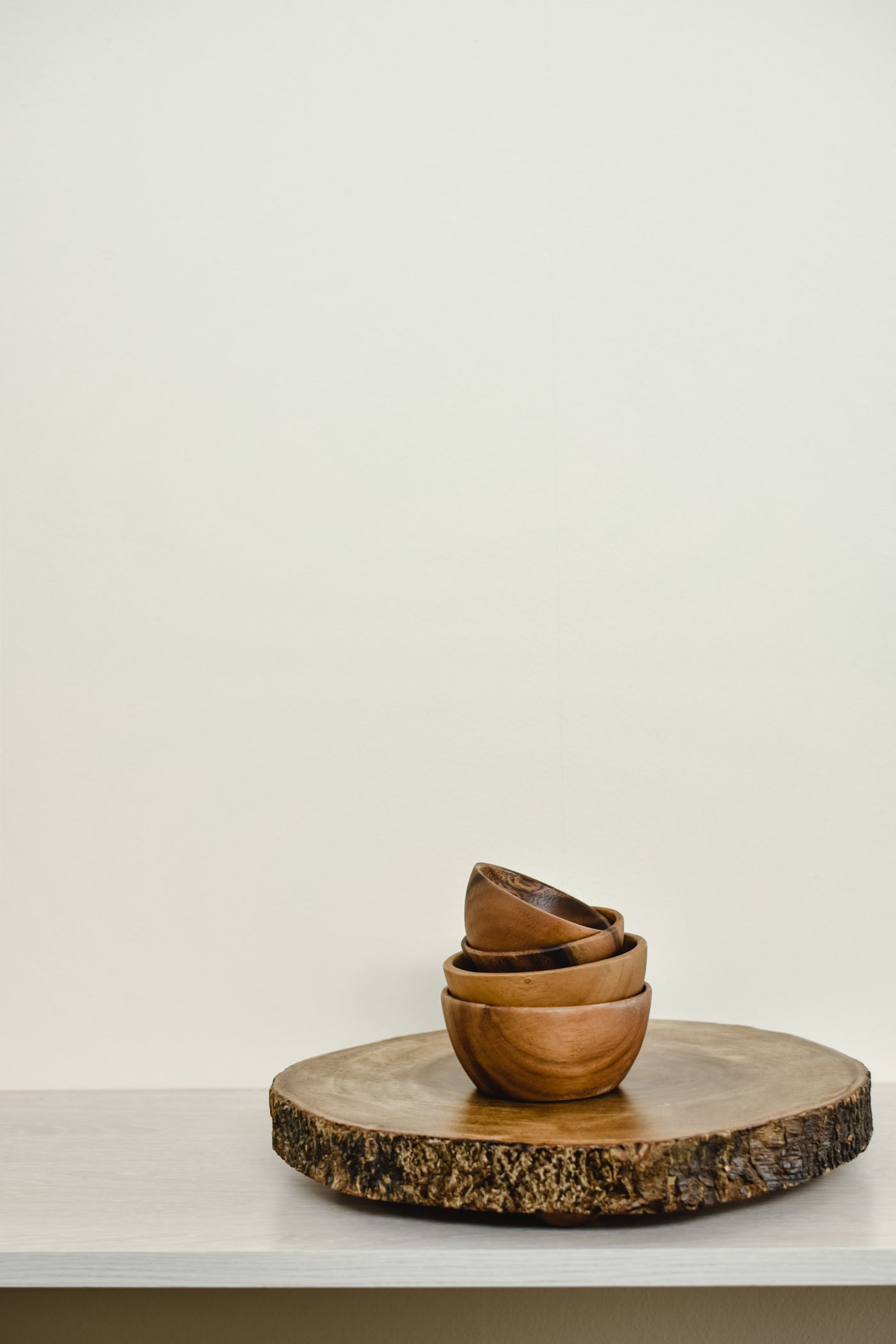 Several finished turned wooden bowls arranged together